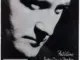 Phil Collins – Another Day In Paradise